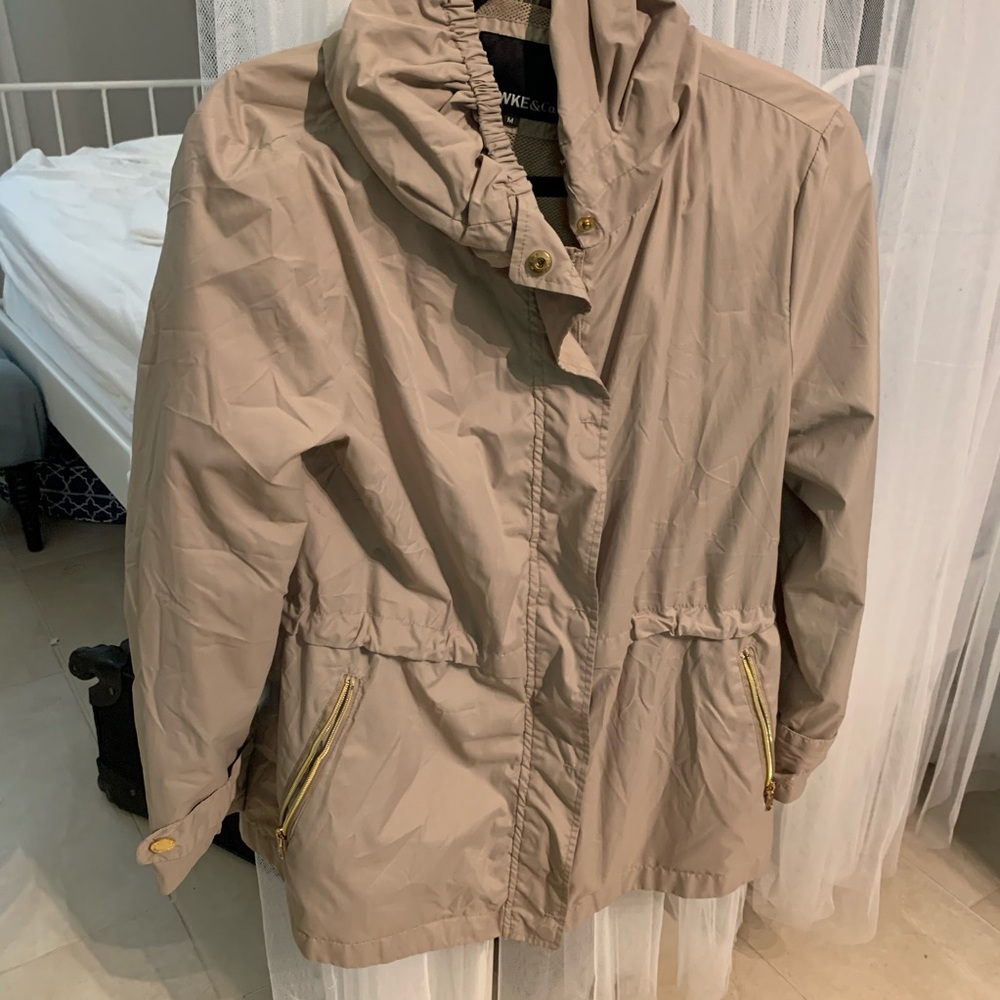 Tan rain coat